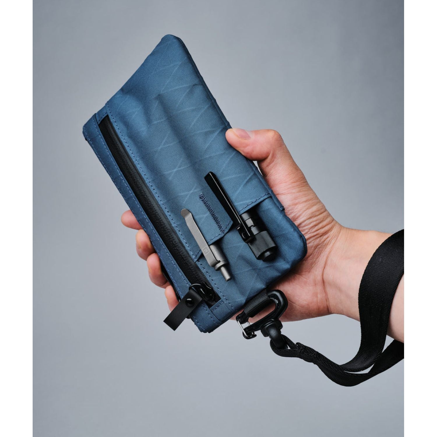 ALPAKA Zip Clutch + Hand Carry Strap