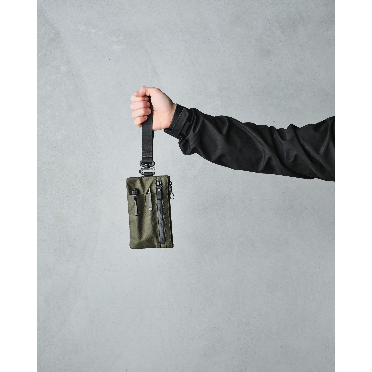 ALPAKA Zip Clutch + Hand Carry Strap